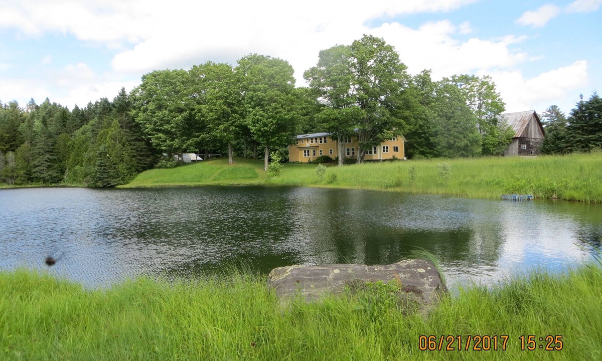 Greensboro House | 450 Acre renovated 1840's 4 bedroom, 3 1/2 bath farmhouse, with large pond.
