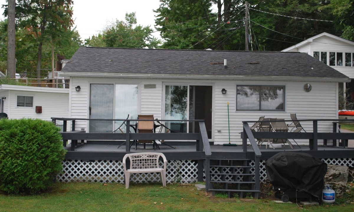 Gilford Cottage | Beautiful Lakefront Cottage with 21' dock space