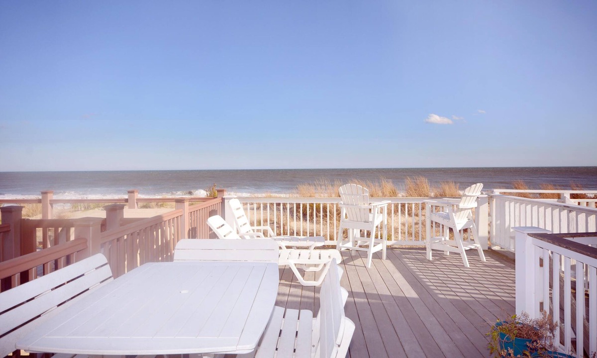 Midtown Ocean City House | Bright, colorful 3 bedroom oceanfront townhouse with WiFi, fun decor, and two decks with fabulous ocean views located midtown and only steps to the beach!