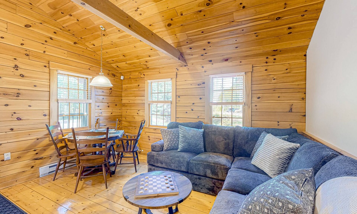 Lincolnville Cabin | Charming log cabin with firepit, lovely interior, and cozy patio/deck
