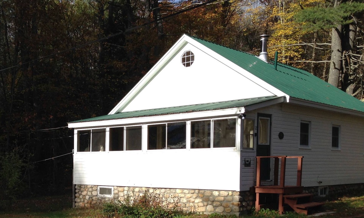 Oxford Cabin | Classic Maine Lakefront Cabin, Porch and Canoe