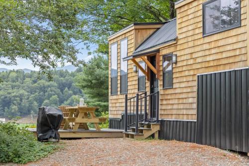 Johnson House | Haven Tiny House w hot tub on river near Stowe