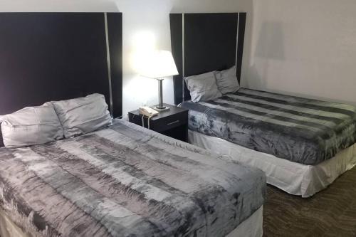 Stillwater Apartment | Hotel 2 Queen Beds Room 124 Booking
