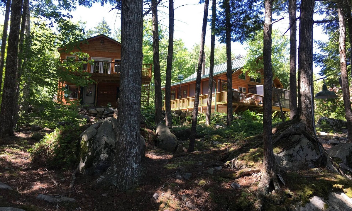 Lowell House | Log home on untouched cold stream lake