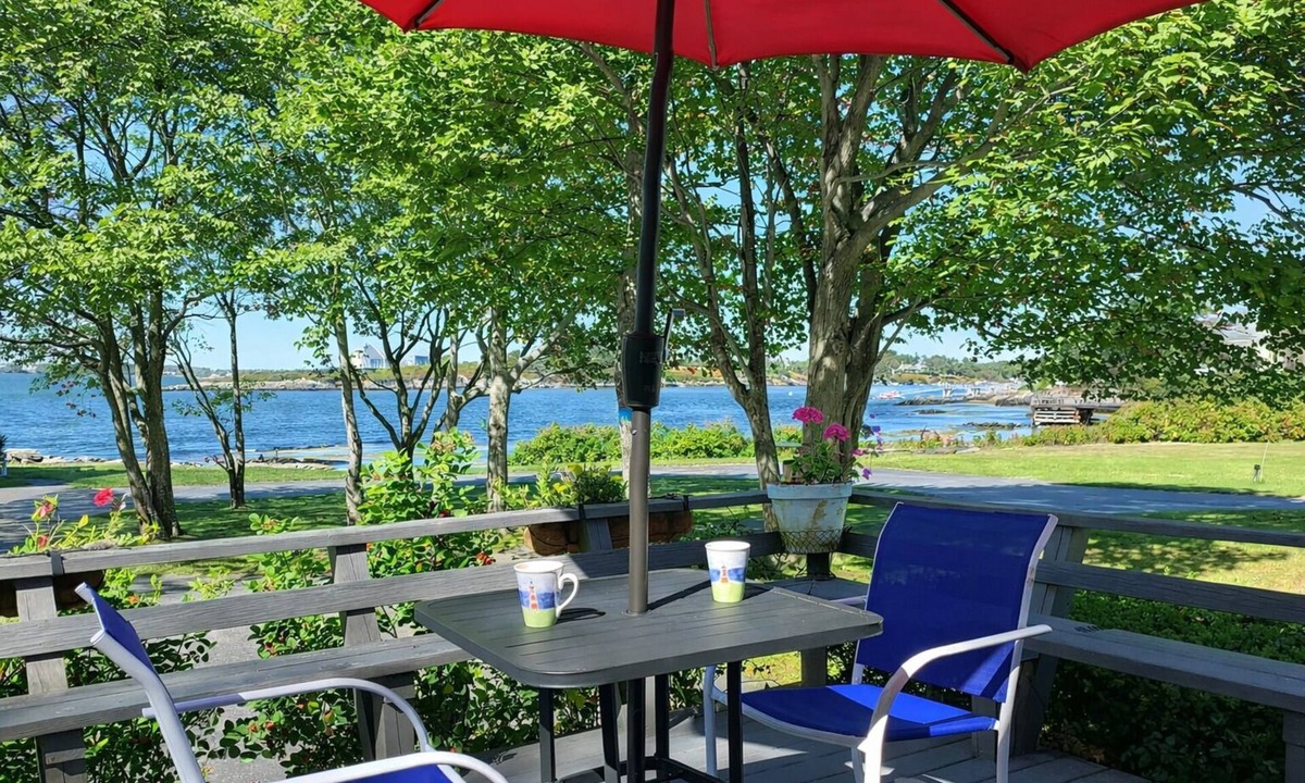 Bailey Island Cottage | Lovely deck to watch the boats come and go, and incredible sunsets!