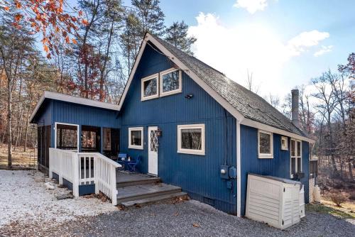 The Woods House | Modern Mountain Chalet with Stone Fireplace & Resort Amenities near Hedgesville, WV