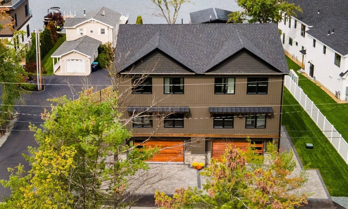 Lochmere House | Modern Winnisquam Lake House sleeps 8 , Boat Slip available