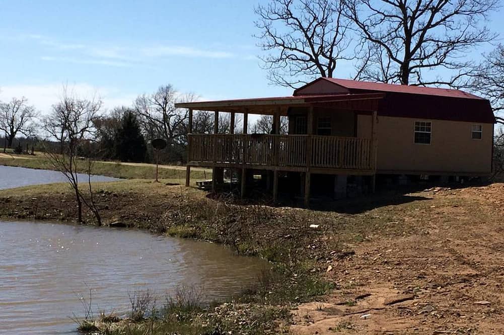 Hughes County Cabin | Rustic Cabin Rental with a Fishing Pond in Allen, Oklahoma