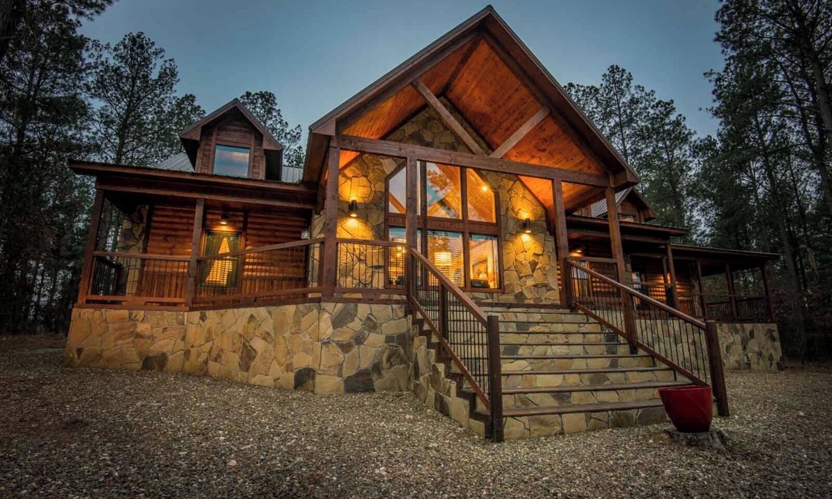 Hochatown Cabin | Soaring cathedral ceilings, gas rock fireplace, large hot tub, smart tv, games.