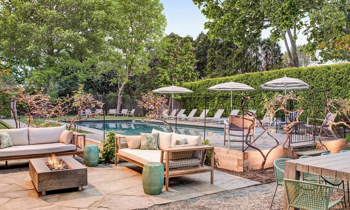 Village of Southampton Hotel | Southampton estate with oversized pool, chefs kitchen, vast lawn,.