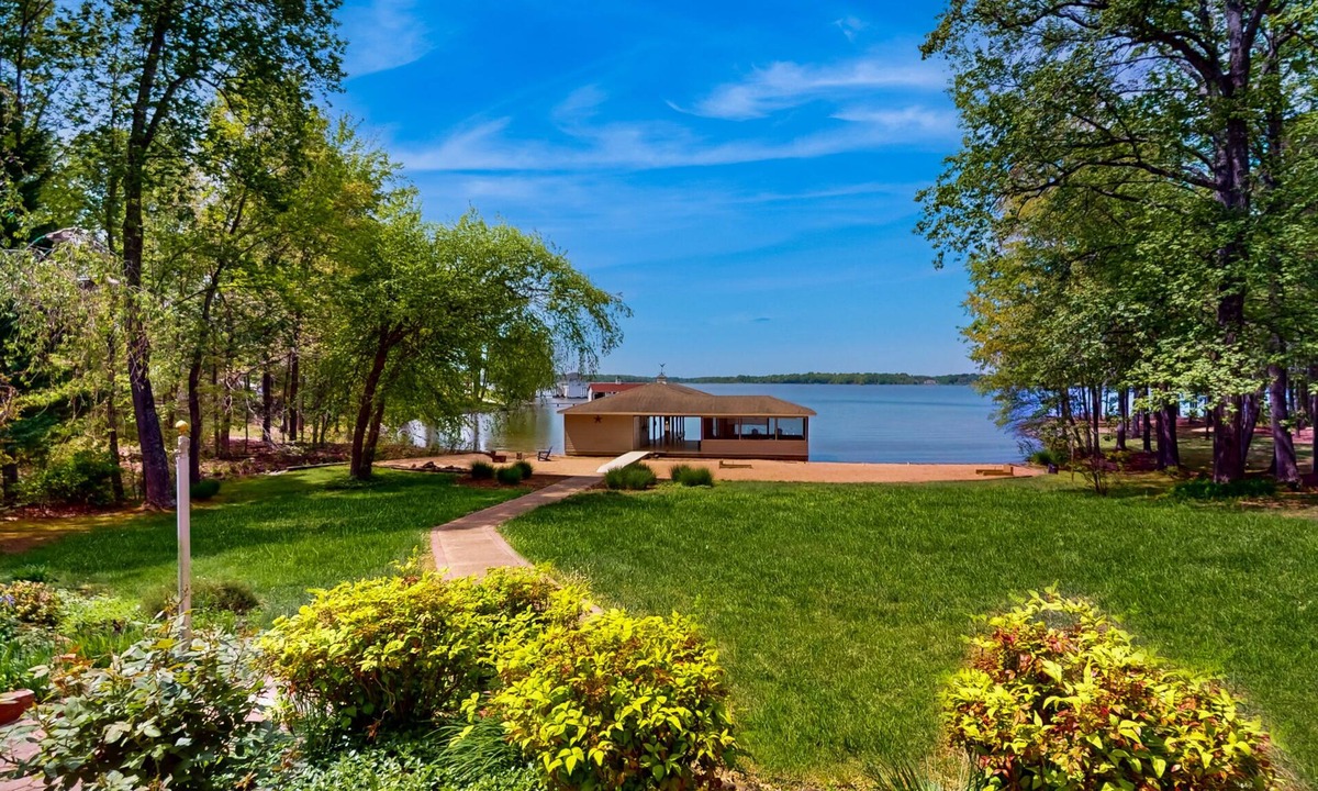 Lakeside Woods House | Spacious lakefront house w/private hot tub, deck, fire pit & grill
