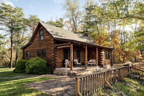 Paw Paw House | Stunning Secluded Log Cabin with River Access in Paw Paw, Maryland
