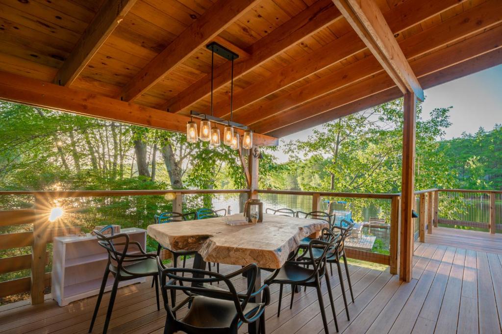 Barnstead House | Stylish lake home with private beach, dock and firepit for swimming, kayaking, hiking