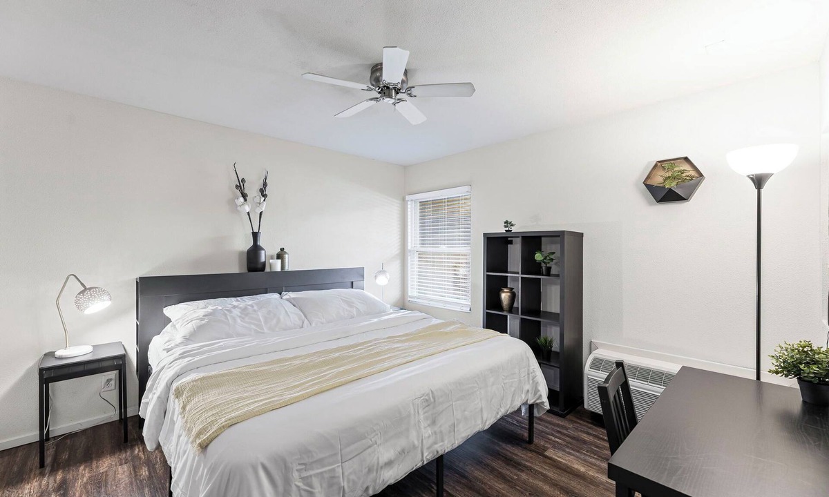 Overland Park Apartment | The Suite Spot King Bed No Stairs Covered Parking