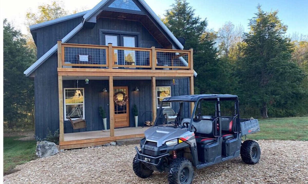 Turners Cabin | Unique,modern, secluded cabin on 95 river front acres-utv-kayaks-trails-hot tub