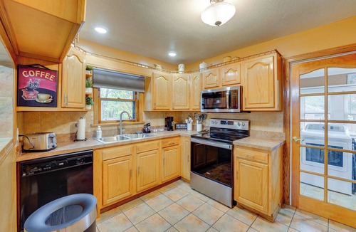 West Akron House | 1 Mi to Akron Zoo: Ranch-Style Home w/Yard!