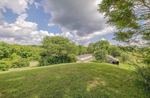 Sharpsburg House | 8700 Wood Rd, Chesterhill, OH - Massive 5 Bedroom Home with Outdoor Grill and Fire Pit