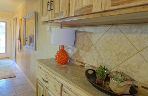 Mount Ida Hotel | A2 - Poolside King Cabana with full kitchen, king bed, sleeper sofa and pool access