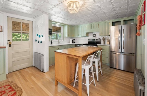 Pawcatuck House | Affordable Luxury Resort Home with an In-Ground Heated Pool & Hot Tub. Sleeps 10