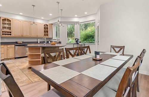 Sand Lake Villa | Anchorage Group Retreat | Dual King Suites + Theatre & Game