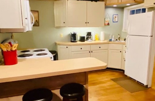 Confluence Apartment | Autumn Escape Bear Paw Cabin: Sleeps 6 · 3BR 1BA · Fire Pit Grill Fireplace