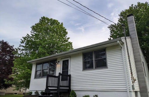 Raymond House | Beautiful home with 150ft sandy beach and private boat launch on Big Sebago!