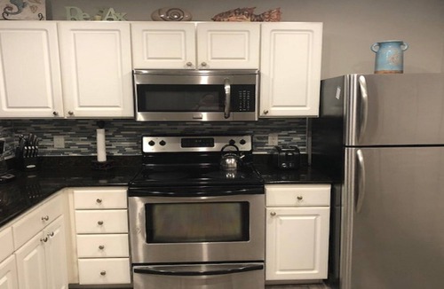 Madeira Beach Condo | Beautifully Updated Madeira Bay Resort Unit 401 - Steps from Sand and Fun!