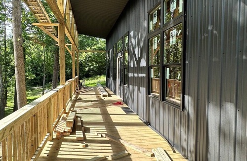 Gallipolis Ferry House | Brand new creekside home with hot tub, private dock and boat ramp!