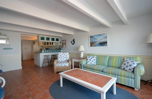 Midtown Ocean City House | Bright, colorful 3 bedroom oceanfront townhouse with WiFi, fun decor, and two decks with fabulous ocean views located midtown and only steps to the beach!