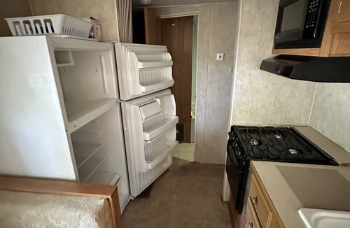 Glouster House | Camper located in the heart of Burr Oak State Park