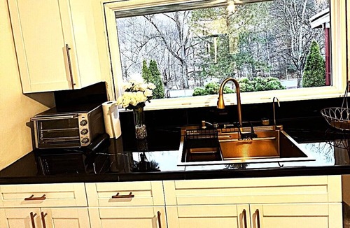 Elkins House | CampRV: Main Lodge House, The Lookout studio apartment, RV hookup, camping