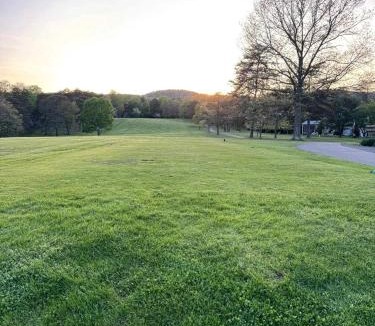 The Woods House | Charming Cabin on Golf Course with Fireplace & Resort Perks in Hedgesville, West Virginia