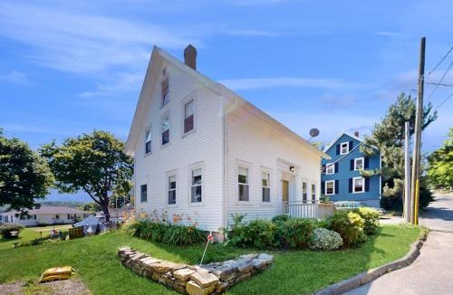 Bath House | Charming Cape-style House with Panoramic River Views and Modern Amenities