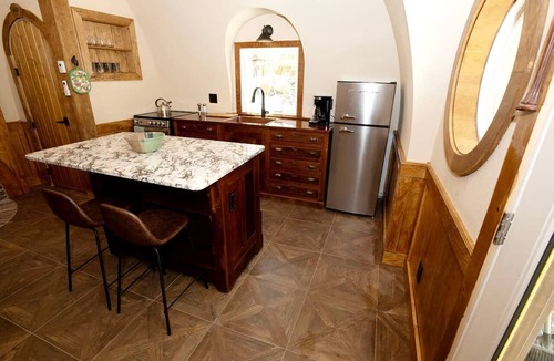 Springvale Cabin | Charming Luxury Hobbit House with Private Hot Tub in Tranquil Woodlands on Littlefield Pond in Springvale, Maine