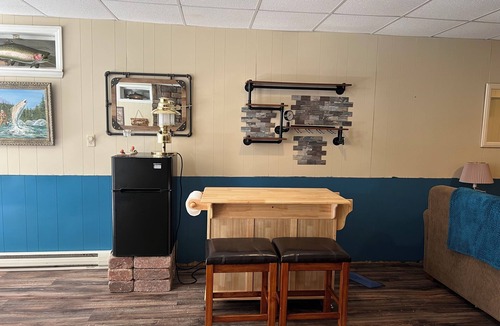 Elkins House | Charming riverfront home with beautiful views, hot tub and game room. Fishing!