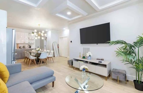 McGinley Square Condo | Chic 3BR-4BD-3Bath Oasis with Backyard Near NYC