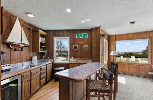 Pocasset House | Classic Cape Cod Home with a Heated Pool, Hot Tub and Spectacular Ocean Views.
