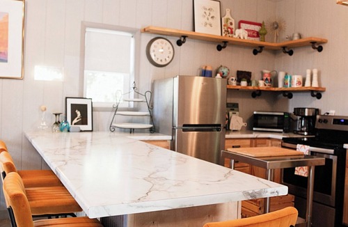Kerr House | Clean and cozy barn home nestled in the trees with peaceful outdoor spaces!