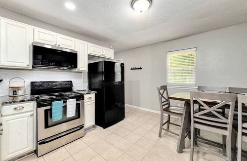Independence Apartment | Clean furnished 2BR half-duplex for 30+ day stays. Utilities included, fast WiFi, and a comfortable setup for traveling professionals, relocations, or insurance stays. Convenient access to Kansas City and surrounding areas.