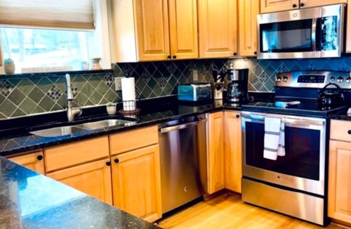 Locke Lake Colony House | Come relax and play! Gameroom, kayaks, paddleboards, fire pit, screen porch