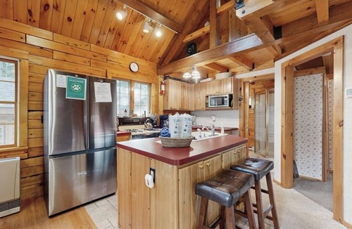 Beaver Cove House | Cozy cabin with covered porch, firepit, grill, fireplace, & washer/dryer