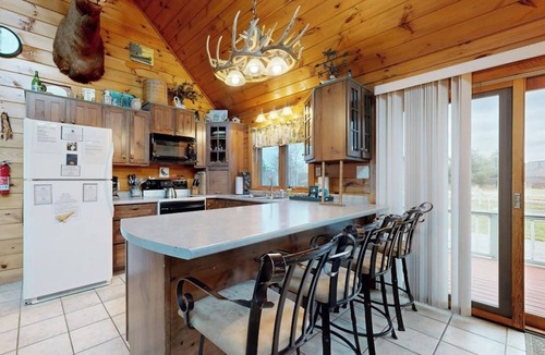 Greenville House | Cozy, dog-friendly waterfront cabin with large yard, porch, dock, & lake views