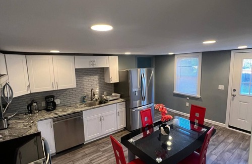 South Side Apartment | Cozy Gorgeous with a back yard and parking pet friendly on the heart of Waltham