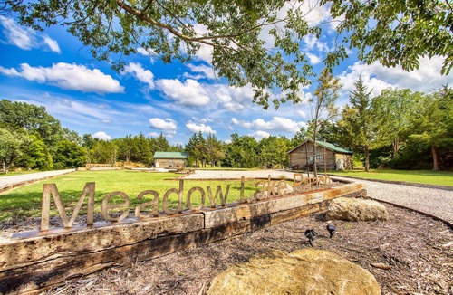 Sand Springs Cabin | Cozy Lakeside Log Cabin. Private Lake, Peaceful & Secluded. Pet-friendly!