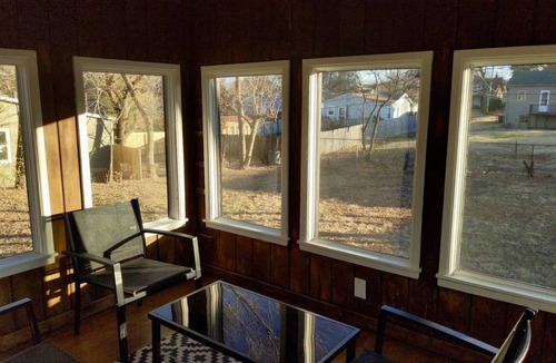 South Kansas City House | Cozy Waldo Hideaway - King sized bed with fenced in backyard