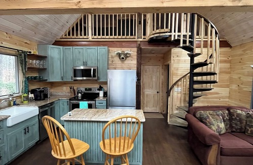 Boscawen House | Cozy Woodland Cabin Living with Loft and Brookside Views
