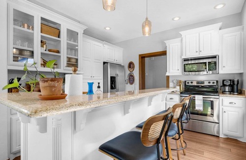 Medicine Park House | Creekside Retreat with Hot Tub, Walk to Downtown Medicine Park, Sleeps 12