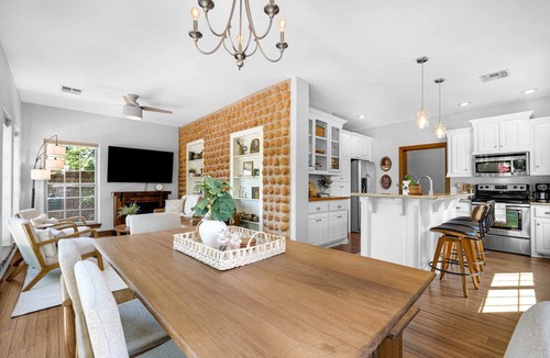 Medicine Park House | Creekside Retreat with Hot Tub, Walk to Downtown Medicine Park, Sleeps 12