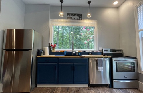 Martinsburg House | Custom Train-Themed Lodge on 7 Private Acres with Walking Trails