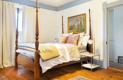 Liberty House | Downtown Liberty Historic Home with Screened Porch